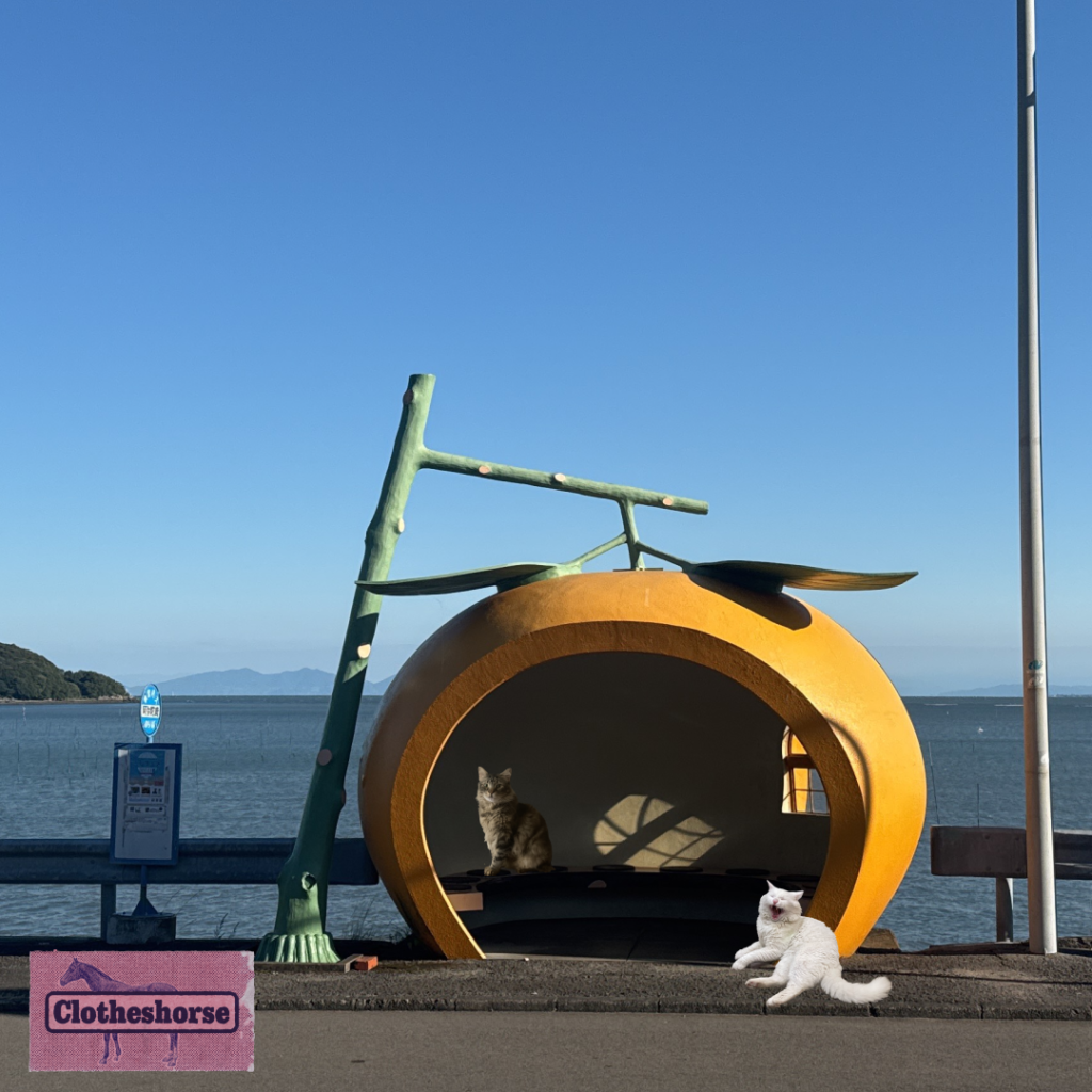 Why is everything so cute in Japan? Brenda and Hutch hang out at one of the fruit bus stops in Konagai, Japan.